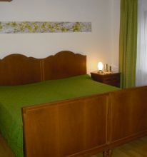 Ferienwohnung - Gemütliches Schlafzimmer mit Doppelbett